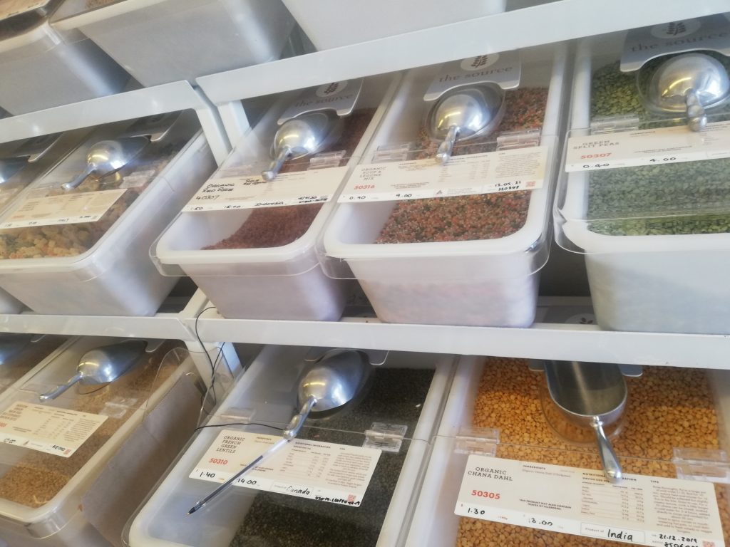 Food in containers at bulk food store